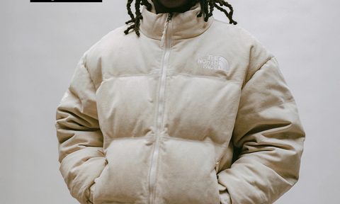 Supreme x The North Face white Nuptse jacket on model