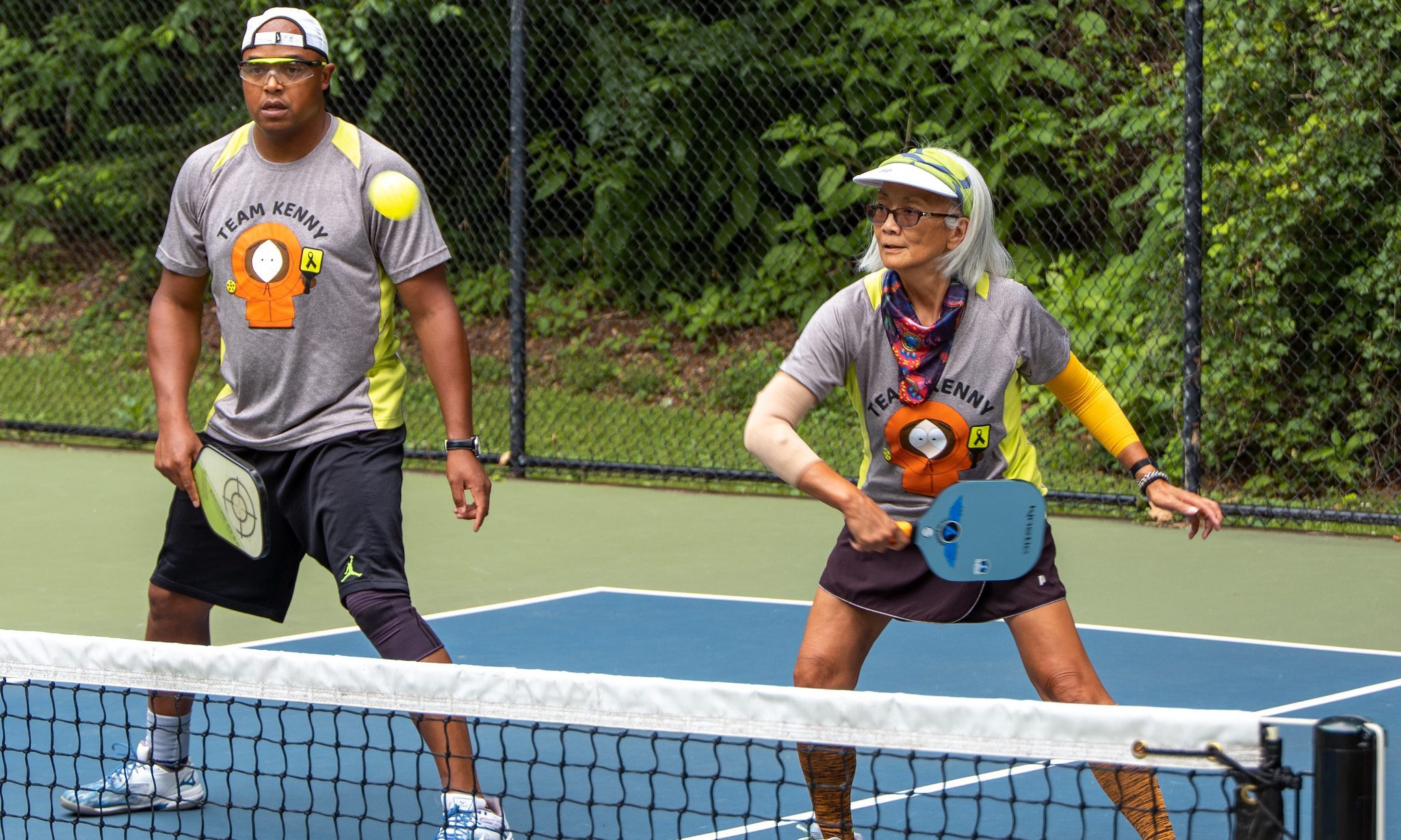 An intense pickleball game.