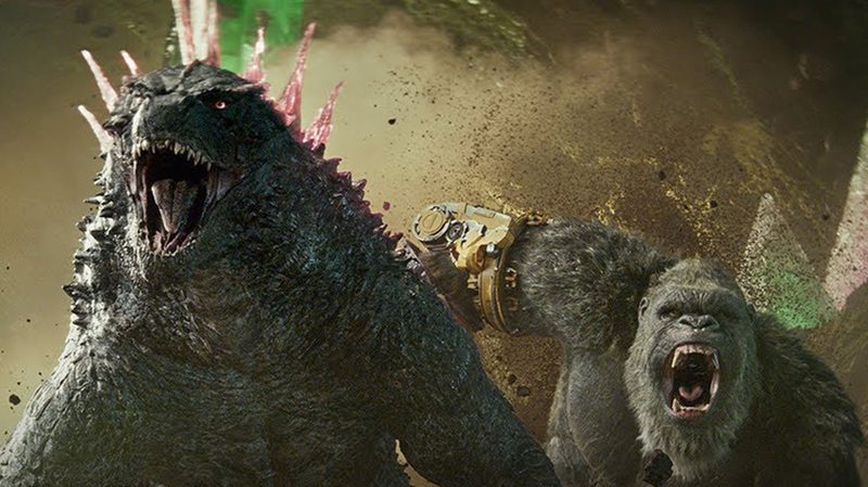 Godzilla and Kong running together.