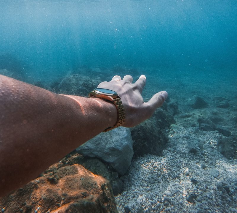 Man diving with watch