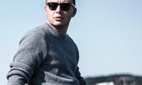 Man in sweater and sunglasses