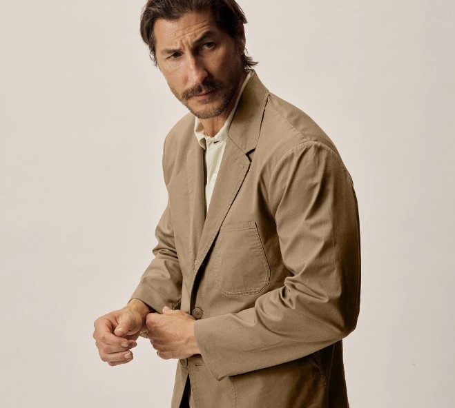 Man wearing Buck Mason Carry On Jacket