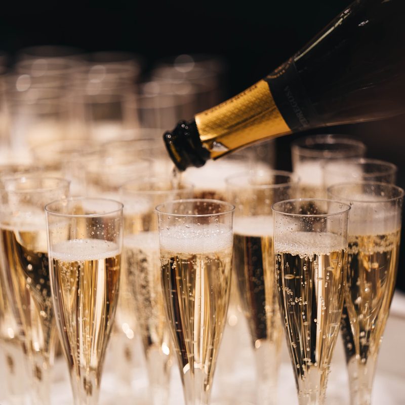 Glasses of champagne on a tray