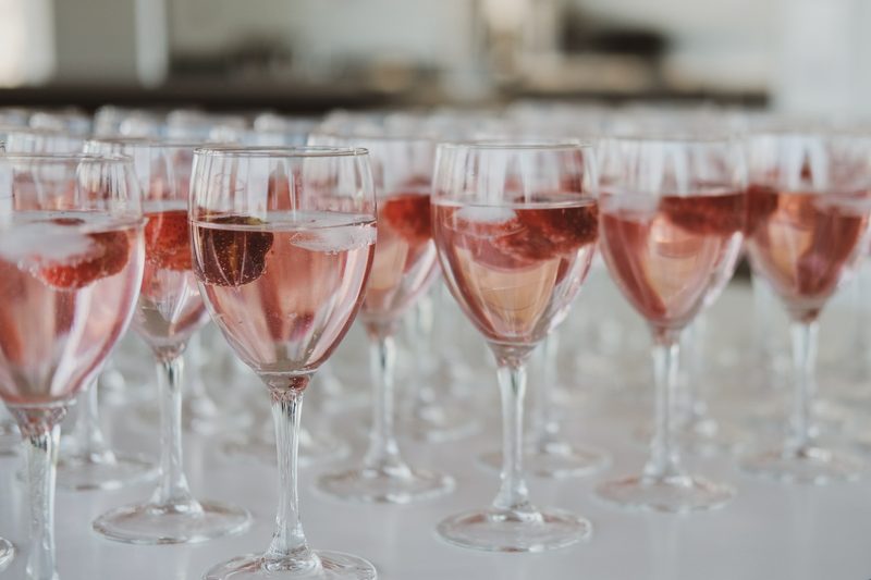 Glasses of rose on table