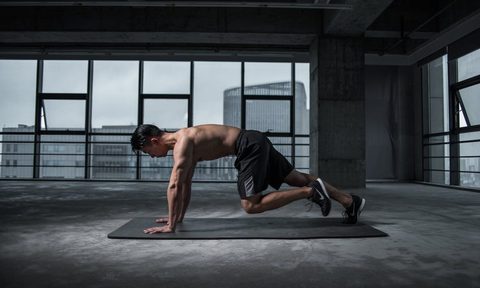 A man doing mountain climbers