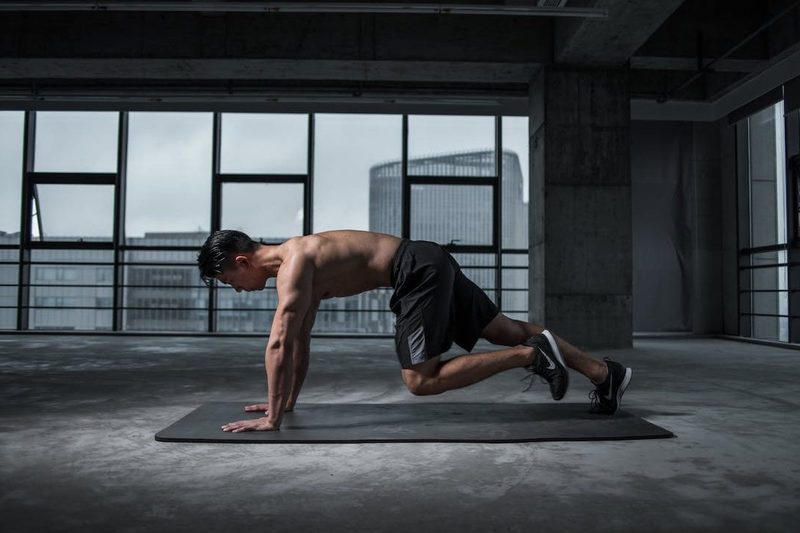 A man doing mountain climbers