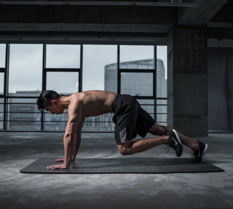 A man doing mountain climbers