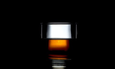 Whiskey with a black background