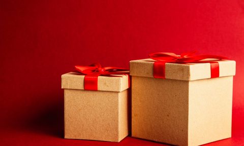 Wrapped presents with a red background