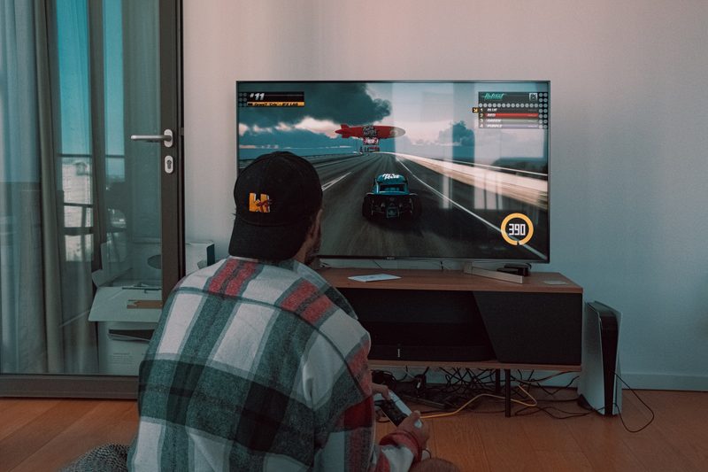 man playing video game