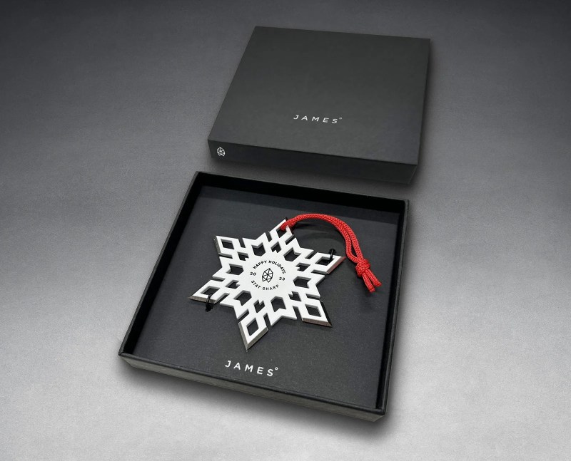 The Throwflake ornament in the box.