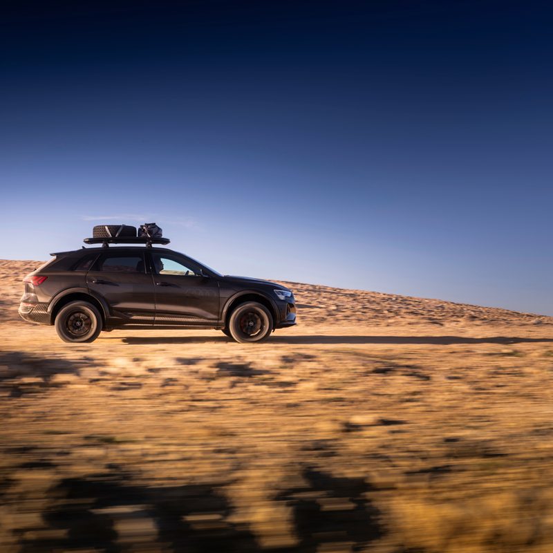 2024 Audi Q8 e-tron edition Dakar driving on a desert road