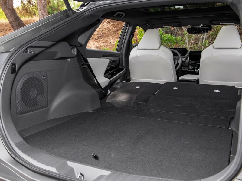 2024 Toyota bZ4X Limited AWD rear cargo space with second row seats rolled and folded forward.