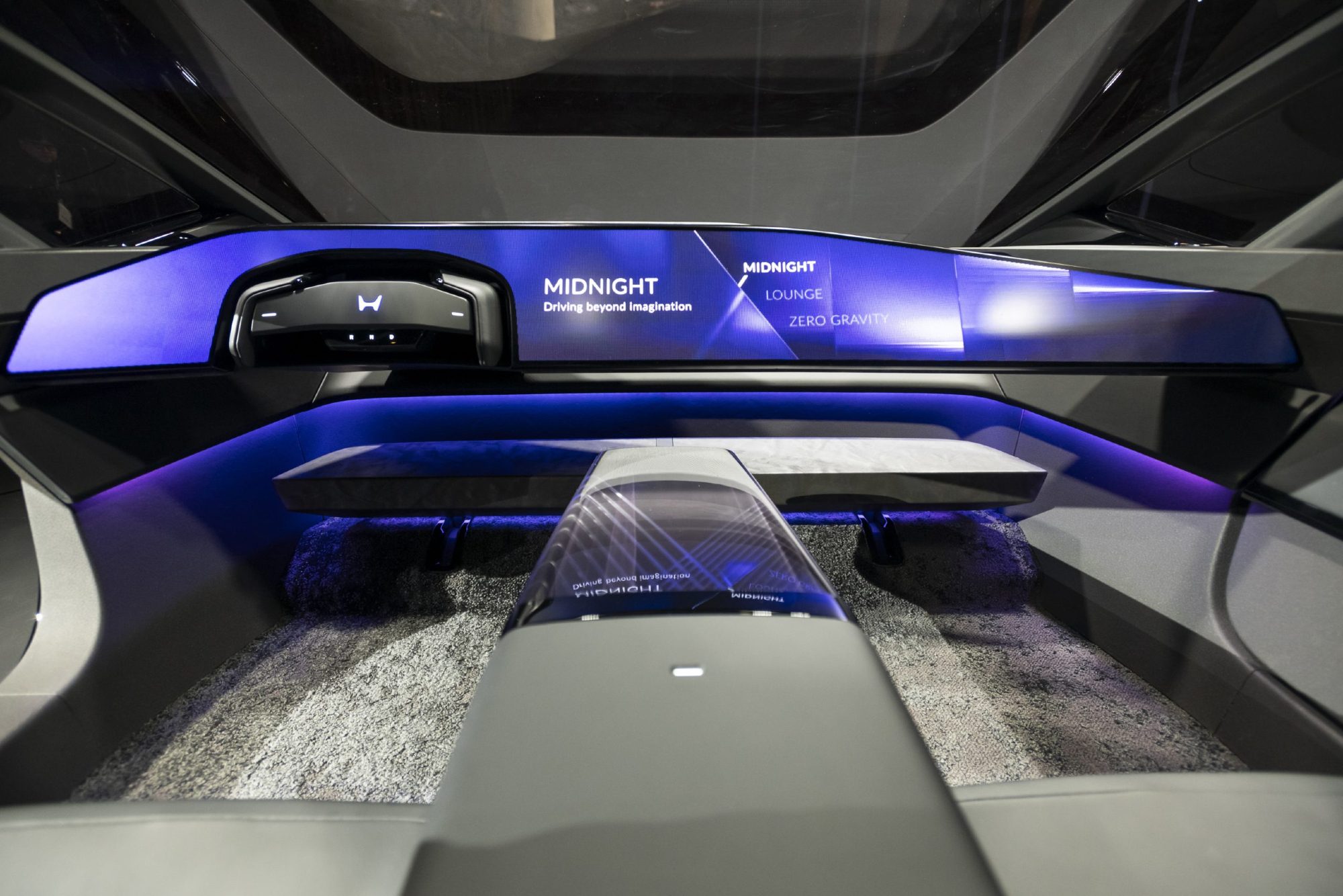 Honda 0 Saloon concept EV looking at the driver and front passenger row from the back row sighted along the front seat center co
