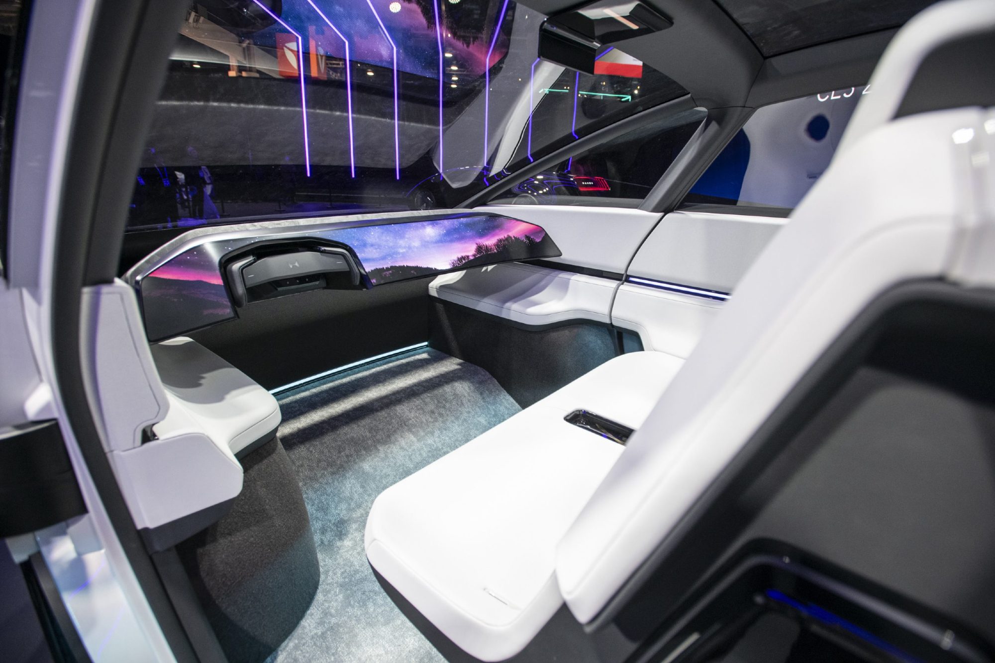 Honda 0 Space-Hub concept EV from left side looking in a driver's seat and cockpit area.