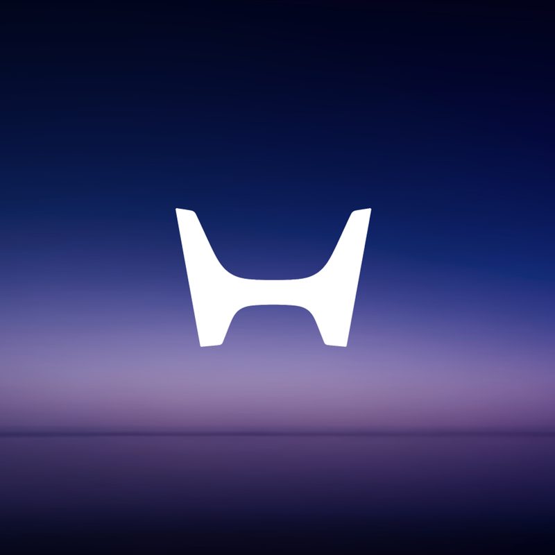 Honda's new H-mark for EVs shown as a white H against a gradient blue background.