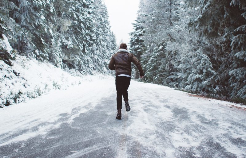 Man running in snow