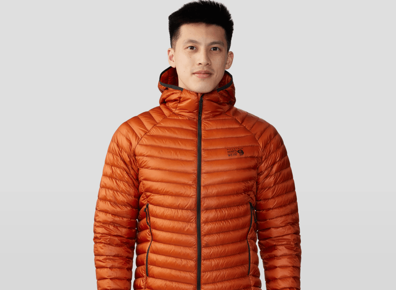 A man wearing the Mountain Hardwear Ghost Whisperer Jacket.