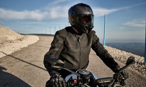 Shark motorcycle helmets on rider