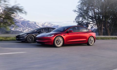 Tesla Model 3 Highland refresh two cars, one red one gray, both headed the same way on a highway.