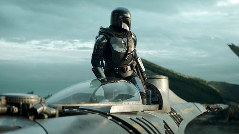 Din Djarin disembarks from his ship on The Mandalorian.