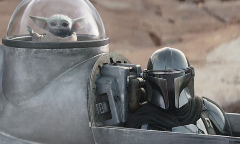 Grogu and The Mandalorian in a scene from season 3 of The Mandalorian.