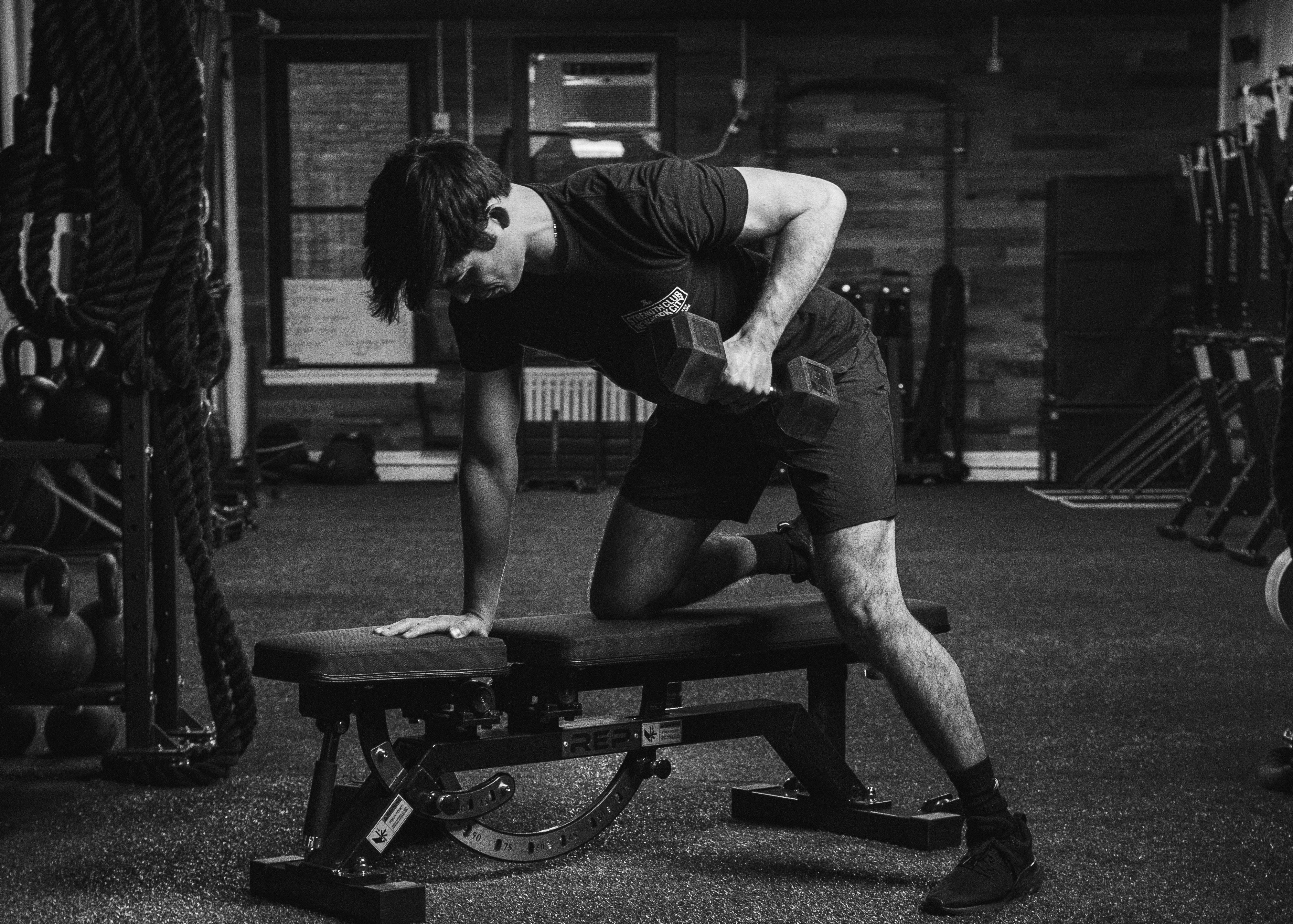 Man doing dumbbell rows.