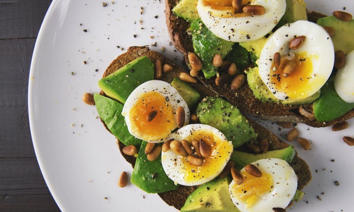 a bowl of salad with eggs
