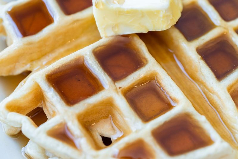 Closeup of waffle with syrup