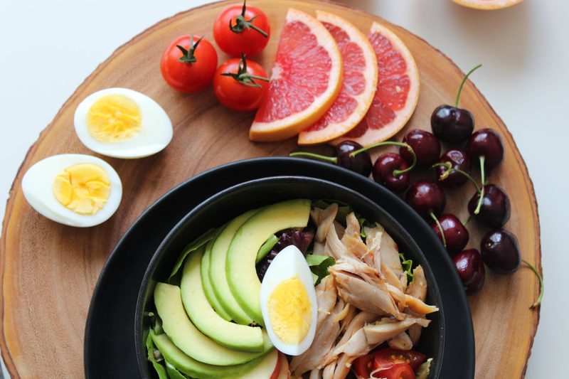 wooden serving tray of healthy food