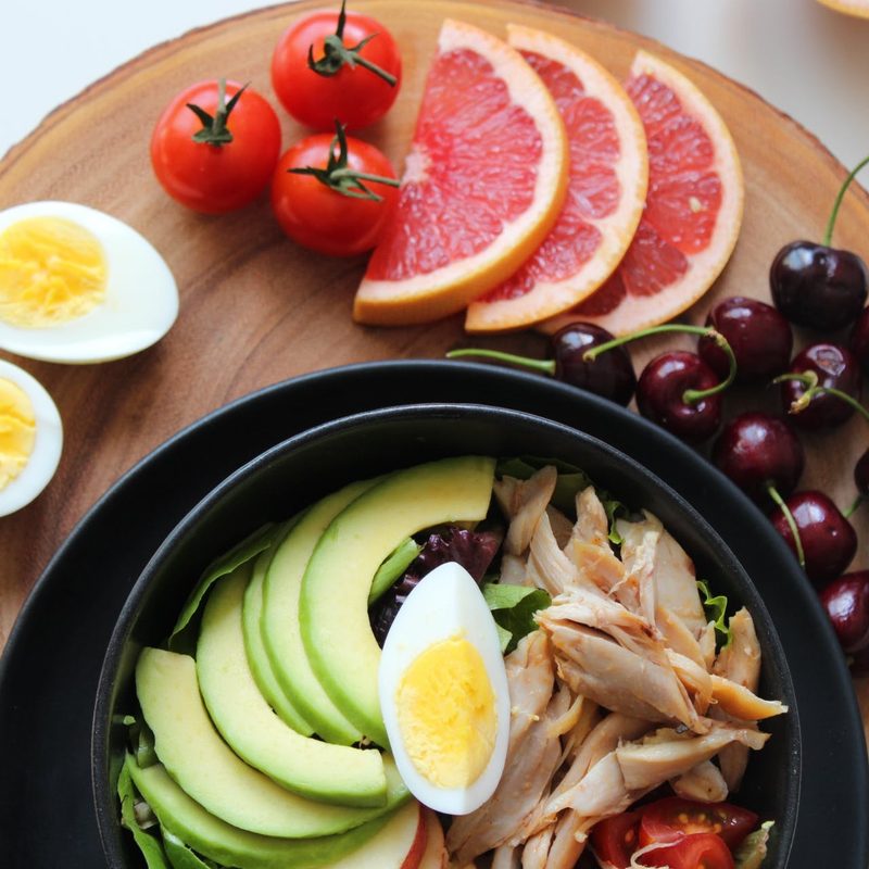 Wooden serving tray of healthy food