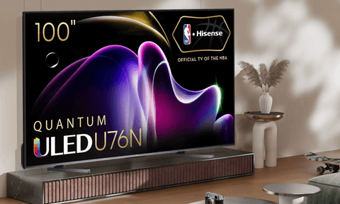The Hisense 100-inch U76 QLED TV placed in a living room environment.