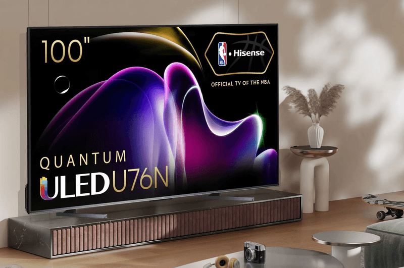The Hisense 100-inch U76 QLED TV placed in a living room environment.