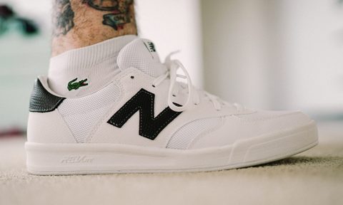man wearing New Balance sneakers