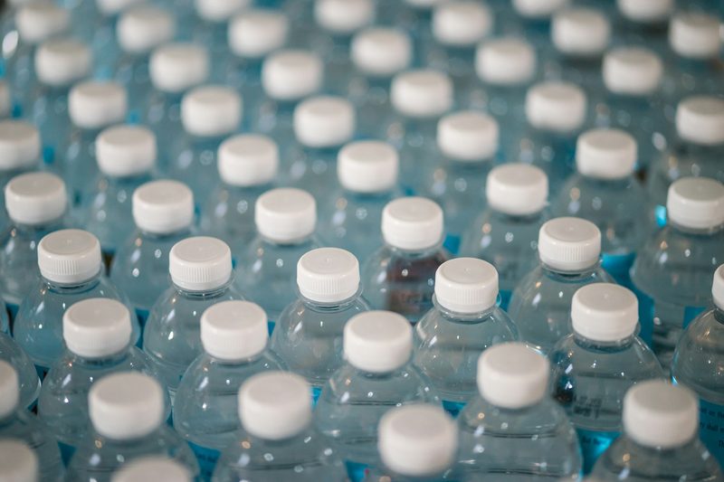 Tops of water bottles