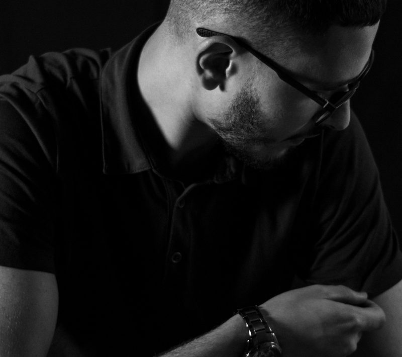 man in black polo and watch