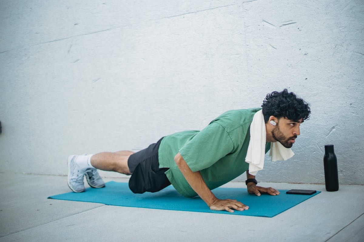 a man doing push ups
