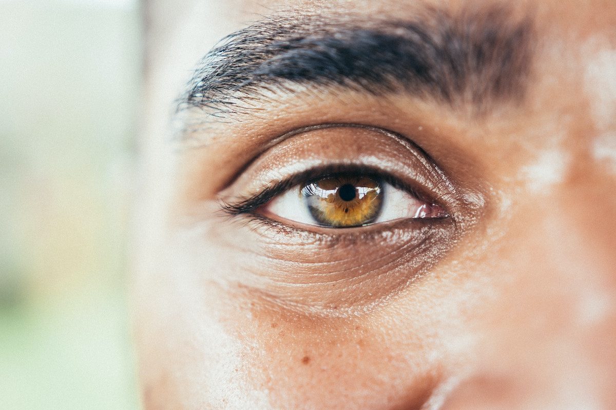 a close up of a man's eyes