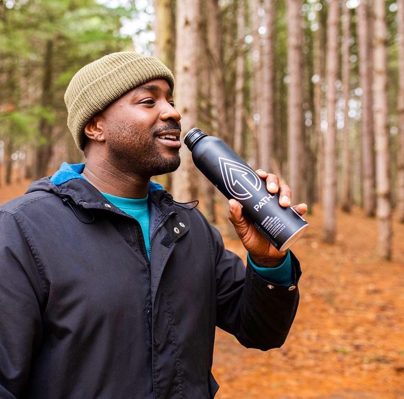 Man drinking from Path water bottle
