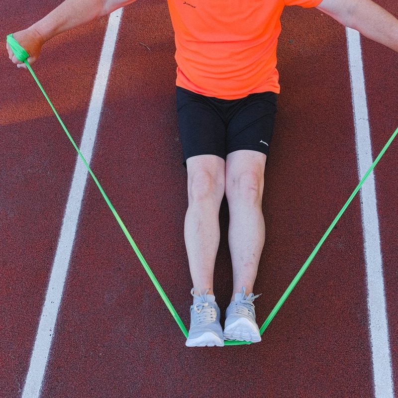 Man using resistance bands.