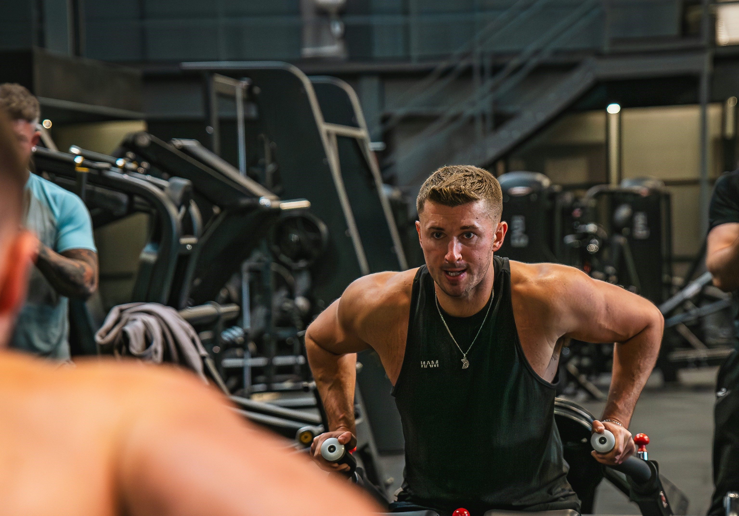 Tricep pressdown machine.