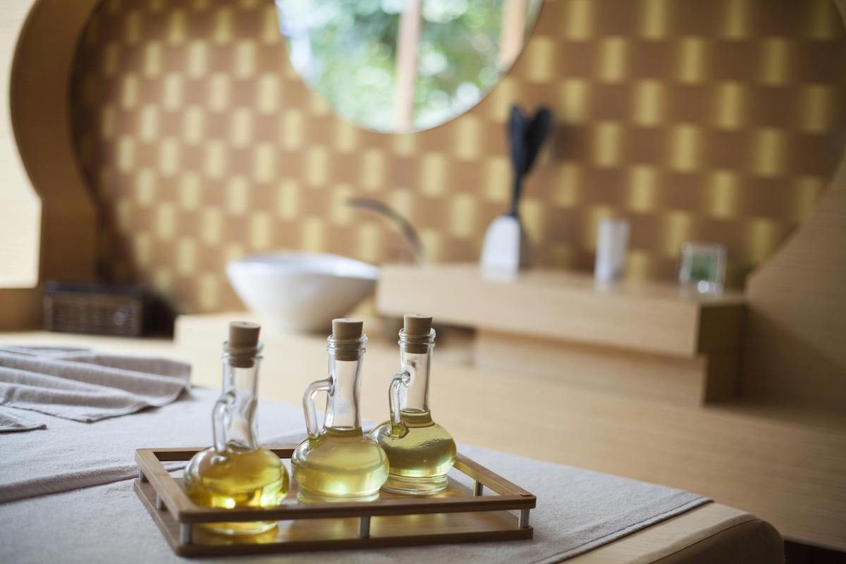 three olive oil canisters
