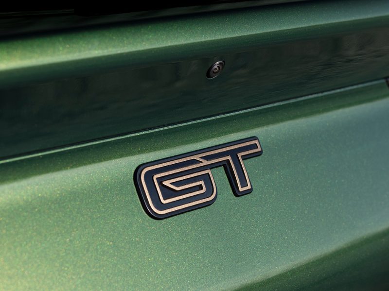 2024 Ford Mustang Mach-E Bronze detail GT badging under rear integrated wing.