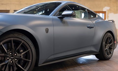 2024 Ford Mustang with Matte Clear Film close view of the left front quarter panel.