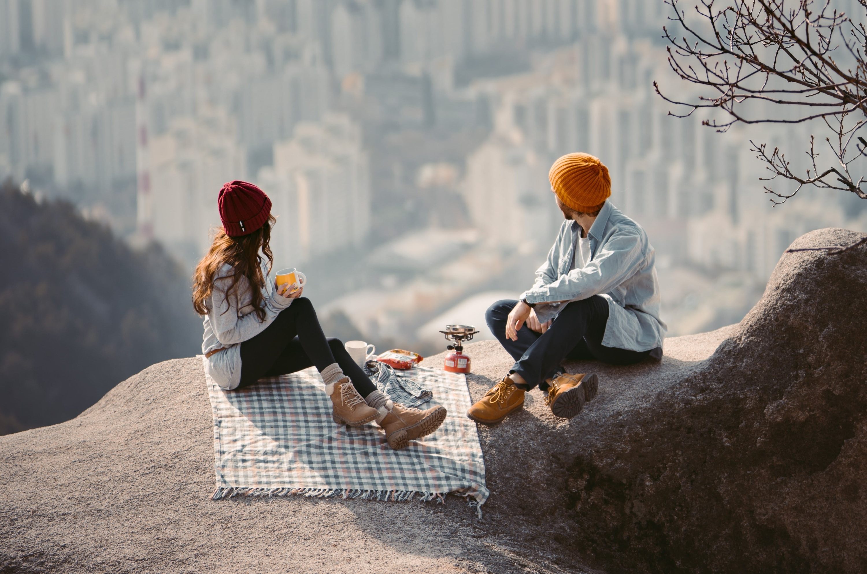Couple sitting on rock