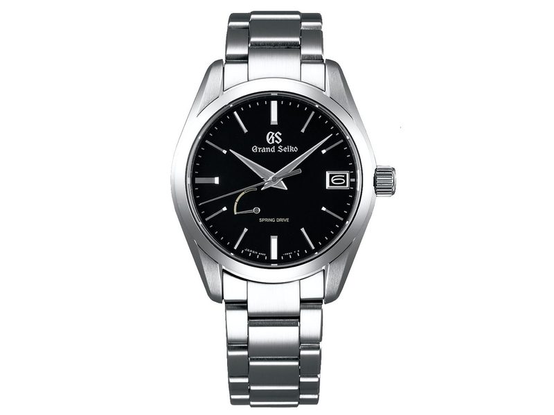 The Grand Seiko SBGA285's front, showing the dark black dial.