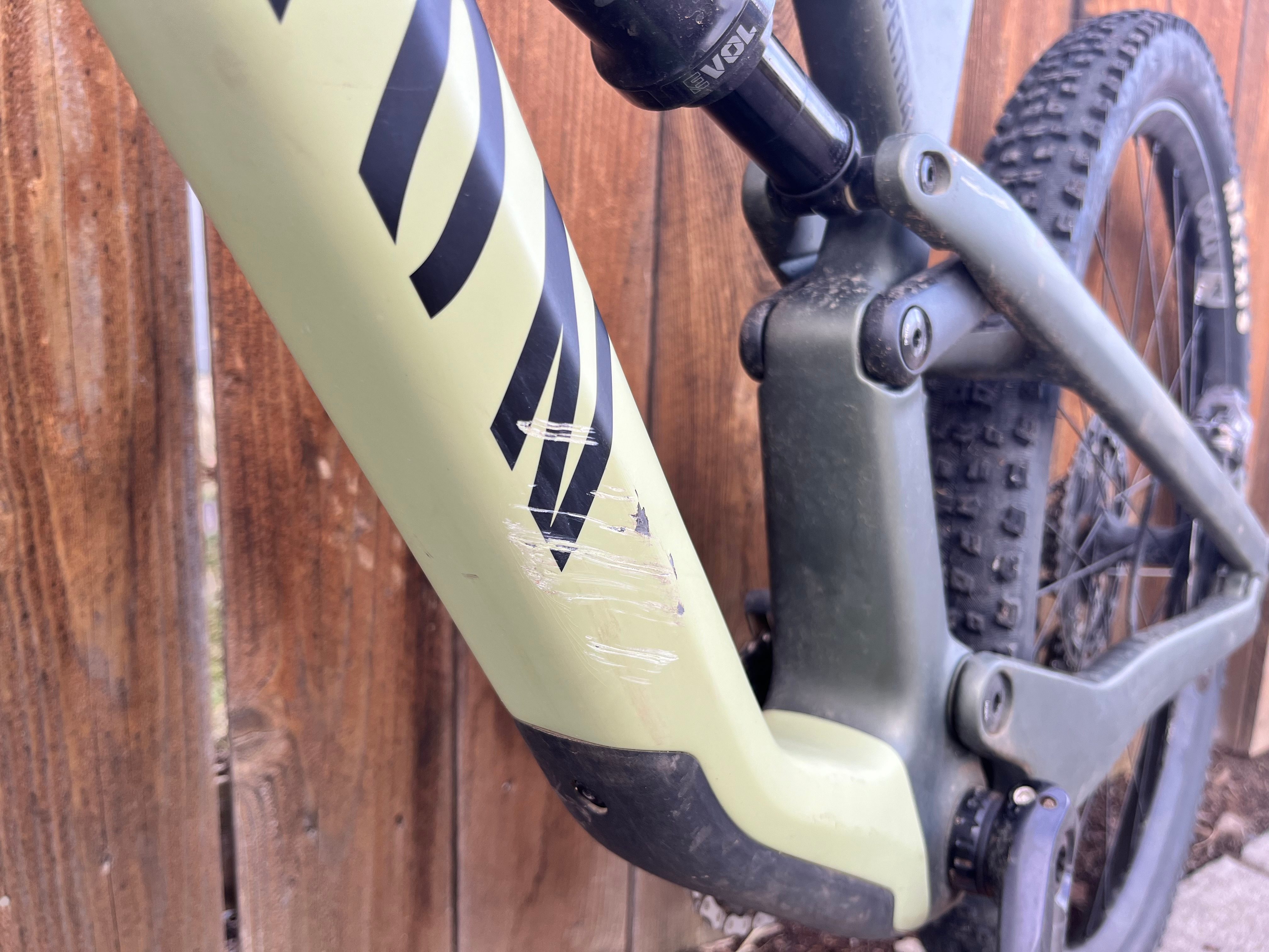 A mountain bike with damage to the paint