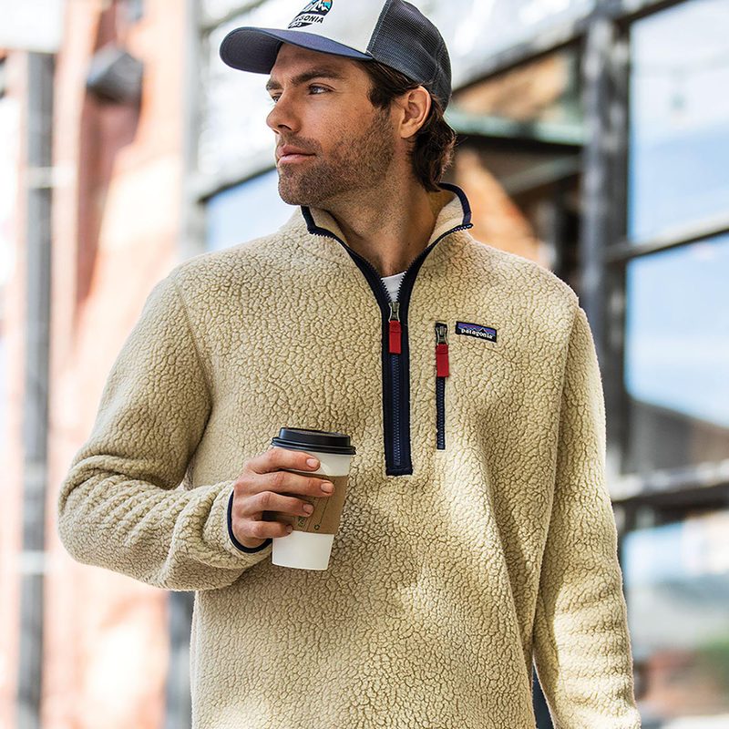 A man wearing a retro Patagonia fleece.