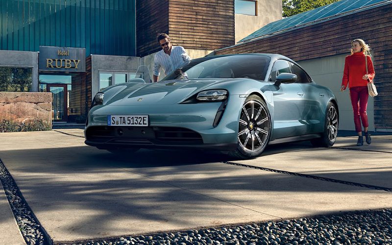 A Porsche Taycan in the street.