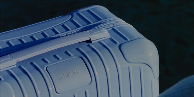 A close up of the Rimowa Sea Blue luggage.